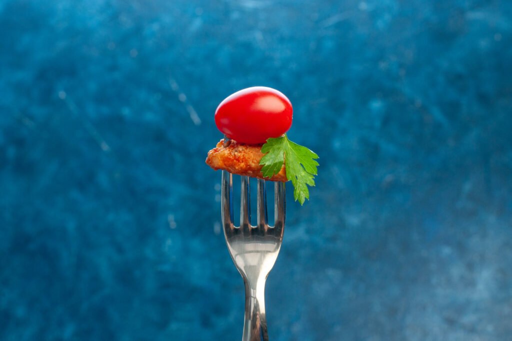 Vegetables on a fork representing controlled fasting